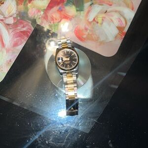 Rolex and still great condition. No box or anything